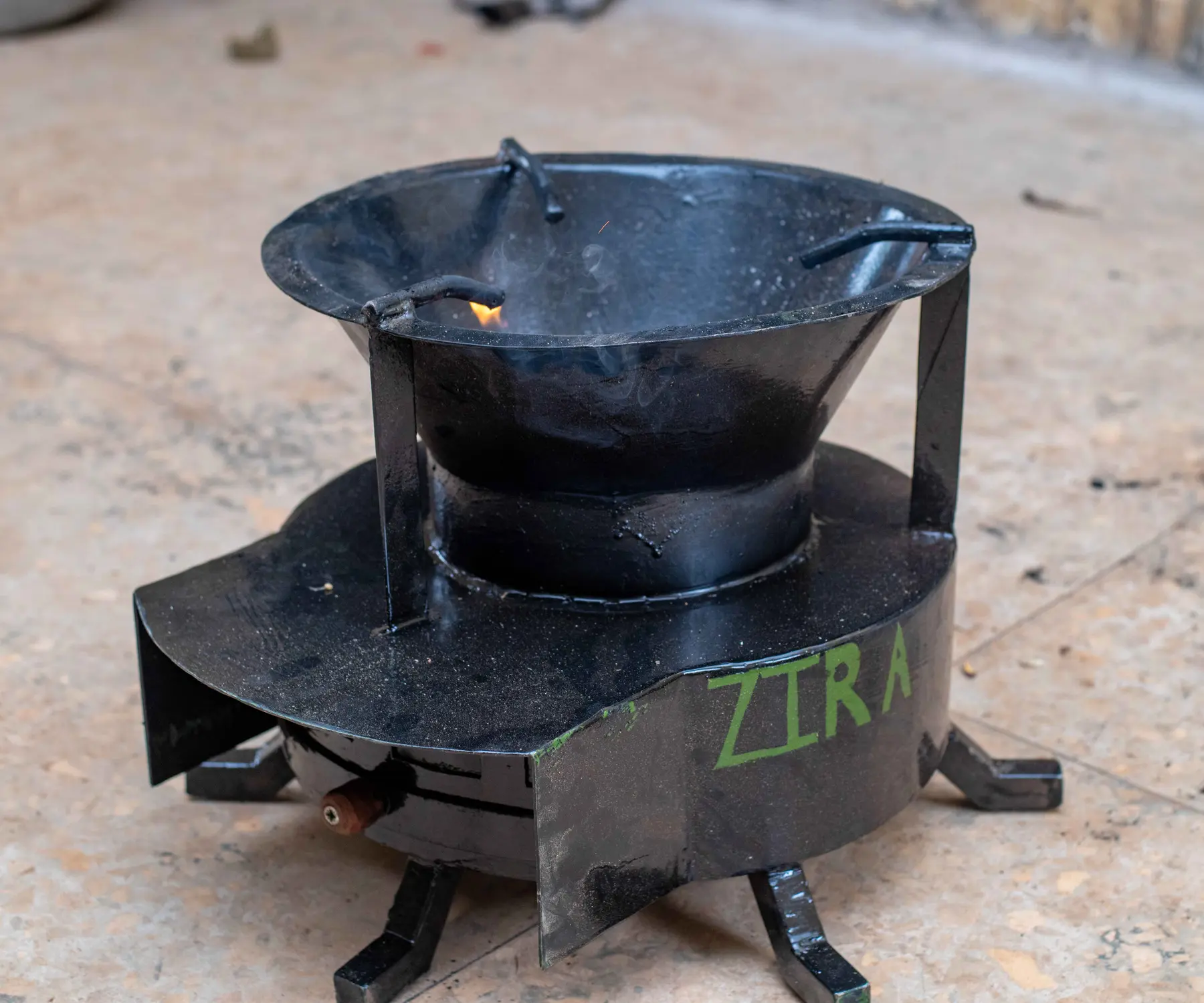 A ZiRA clean cookstove ready for use